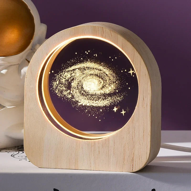 A 3D crystal laser engraved desk decor featuring a galaxy in a wooden frame