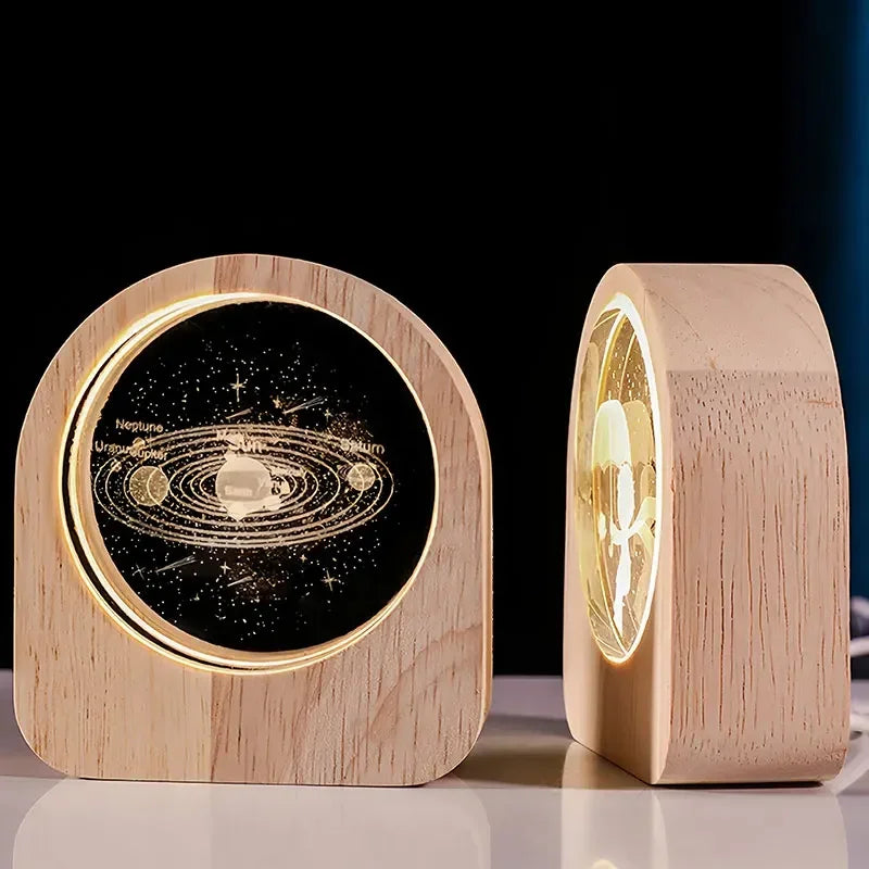 Laser engraved desk decor showcasing the solar system on a black background