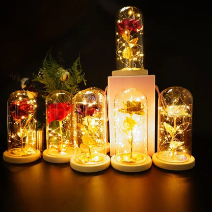 Illuminated Gold Foil Rose creating romantic ambiance in bedroom setting