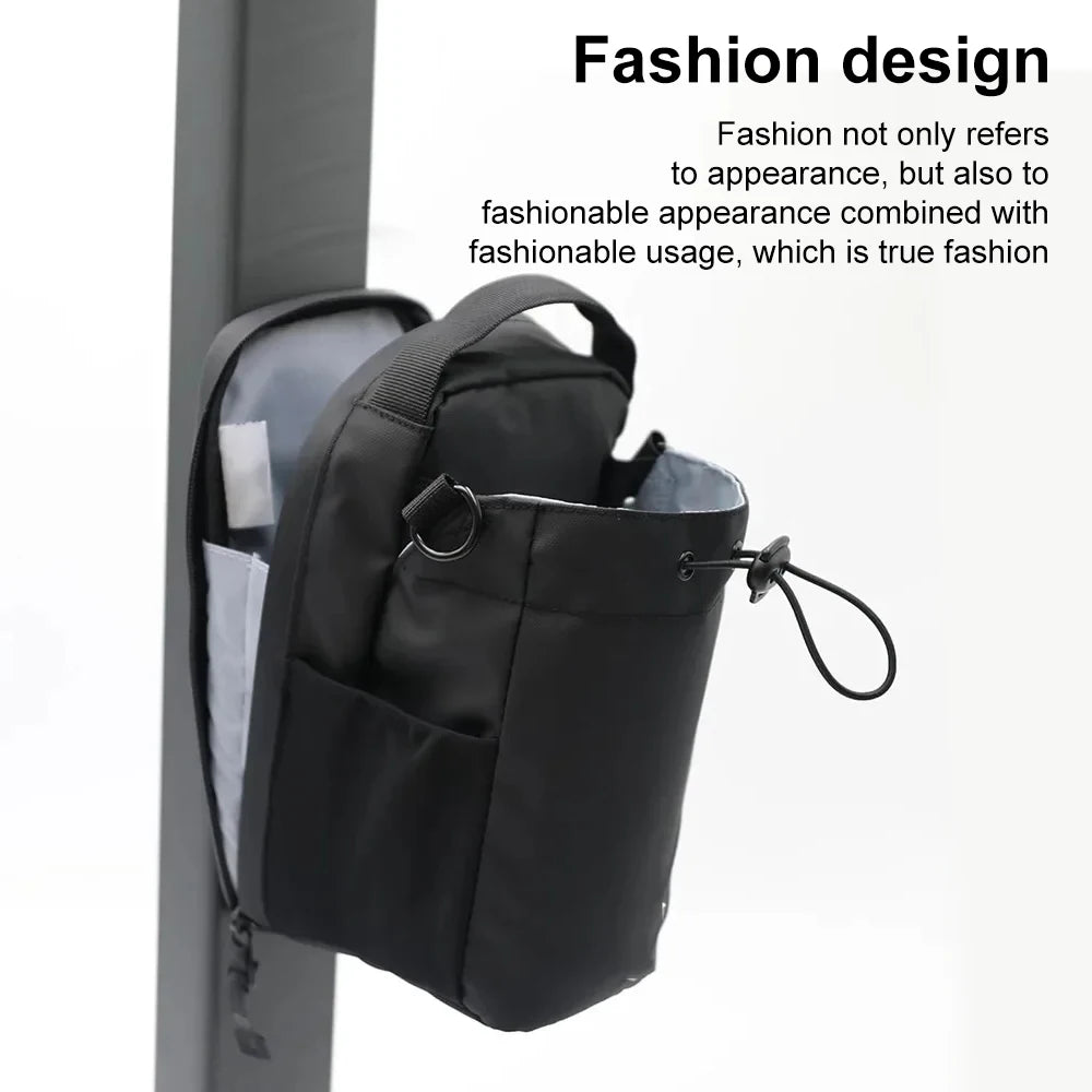 Black backpack with multiple pockets on a white background